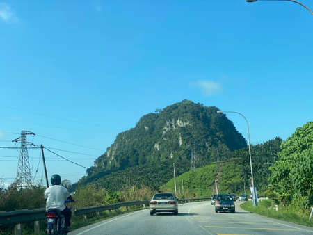 Surround view on the road to the Gua Musang town.