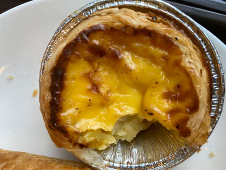 A bite of Portuguese tart background.
