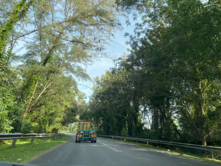Scenery view on the road in to Bisikan Bayu beach.の写真素材