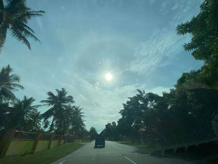 Sunny day view on the road in village area.の写真素材