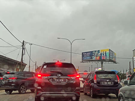 View on the road during raining day in Kubang Kerian, Kelantan.