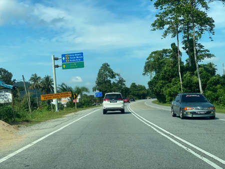 View on the road in from Pasir Puteh to Machang via main road to Gerik. East- West Highway.の写真素材