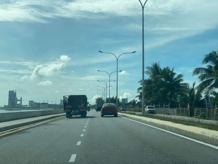 Scenery view on the road from Kuala Nerus to Kuala Terengganu via beach road.の写真素材