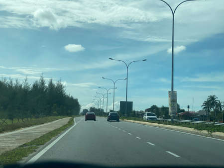 Scenery view on the road from Kuala Nerus to Kuala Terengganu via beach road.の写真素材