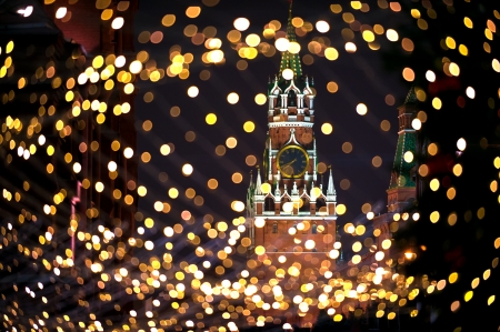 Christmas night Moscow atmosphere with Kremlin Spassky Tower in center holiday background の写真素材