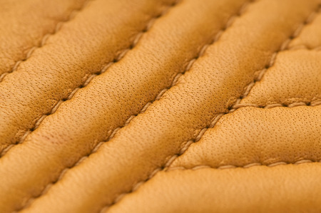natural brown leather texture with stitch macro  backgroundの写真素材