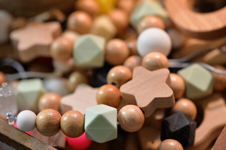 Wooden bijouterie beads close-up beautiful decorationsの写真素材