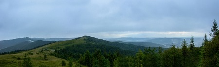 Amazing panorama on the mountain Yavorinka in the Ukrainian Carpathians during the rain. Amazing Panorama of Ukrainian Carpathiansの写真素材