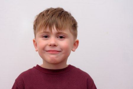 A beautiful Ukrainian boy symbolizes a positive mood for all peopleの写真素材