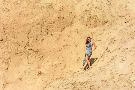 Photos of a wonderful woman in a beautiful dress that is resting on a Ukrainian beach in the Black Seaの写真素材