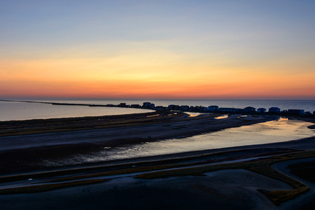 Amazing beach in the resort town on the coast of the black sea during the sunriseの写真素材