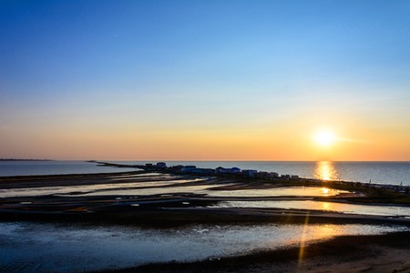 Amazing beach in the resort town on the coast of the black sea during the sunriseの写真素材