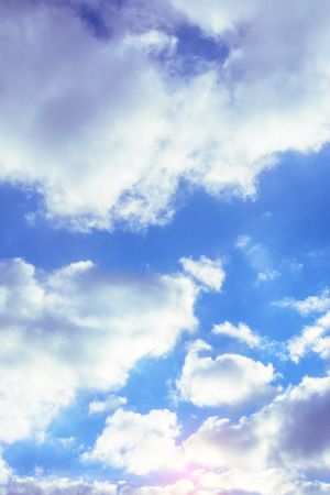 A charming blue sky with amazing fabulous clouds floating around it 2018の写真素材