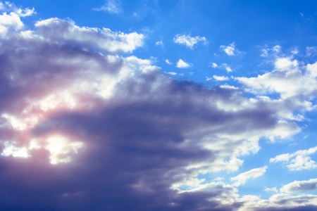 Amazing sky with charming gentle clouds and orange sunshine 2018の写真素材