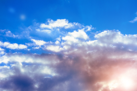 Amazing sky with charming gentle clouds and orange sunshine 2018の写真素材
