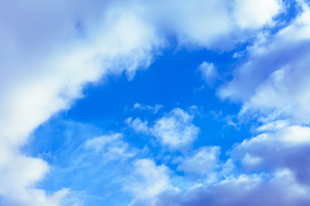 The magnificent blue sky with amazing white clouds surrounds our planet 2018の写真素材