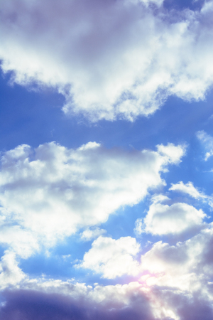 A charming blue sky with amazing fabulous clouds floating around it 2018の写真素材