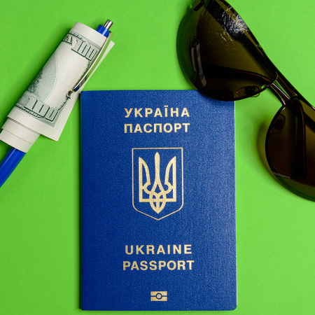 Ukrainian biometric passport with a hundred dollar bill and a pen 2018の写真素材