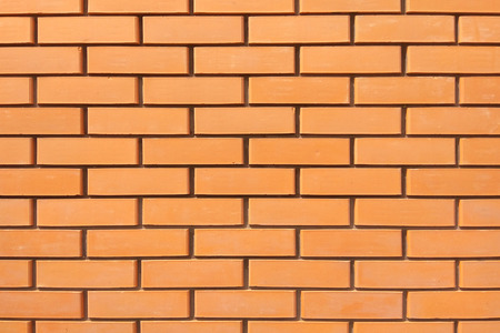 The red brick is lined with a wall textureの写真素材