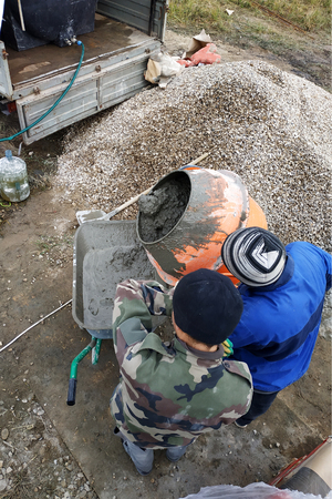 Mobile electric cement mixer and wheelbarrow with cement mortar 2018の写真素材