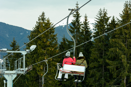 Tourists admire the picturesque landscapes of the Ukrainian carpathians from the observation liftsの写真素材