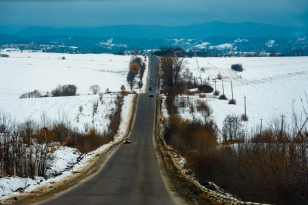 An irritated driver moves slowly on extremely poor Ukrainian roads 2019