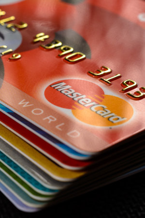 Lviv, Ukraine - 26 April 2019 : Close-up of mastercard credit cards placed on a dark background 2020のeditorial素材