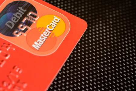 Lviv, Ukraine - 26 April 2019 : Close-up of mastercard credit cards placed on a dark backgroundのeditorial素材