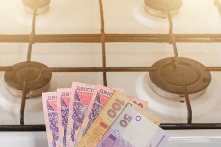 Ukrainian bills of different value near the gas stove. 2019の写真素材