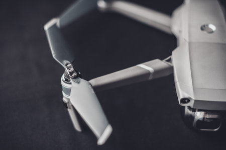 Trostyanets, Ukraine - August 1, 2019: Closeup of DJI Mavic 2 Pro, on a black background, DJI Mavic 2 Pro - with Hasselblad camera and tracking sensors. 2019のeditorial素材