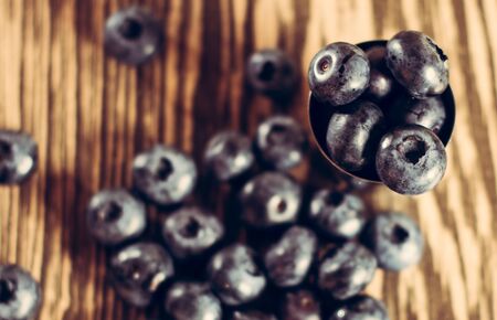 Blue berry is sweet and fragrant on a brown background. 2019の写真素材