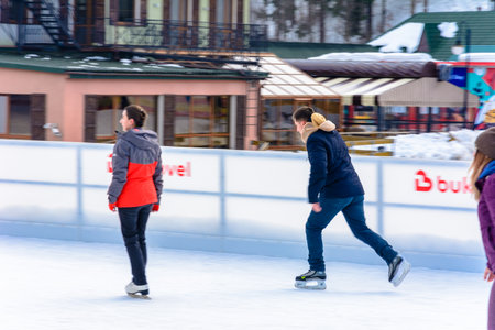 Bukovel, Ukraine February 12, 2019 - people skating relaxing in bukovel.のeditorial素材
