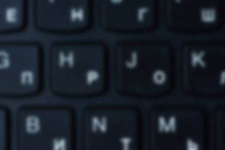 Closeup keyboard and its fragments, white letters on black buttons. 2019の写真素材