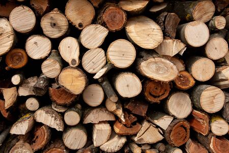 The texture of the wall is firewood, which is laid out very neatly. 2019