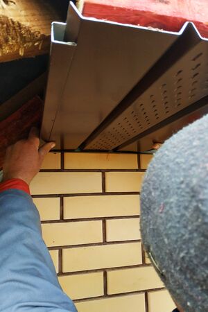 Closeup of eaves hanging in newly built houses.2020