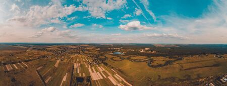 Beautiful landscape of the European plain with fields and a snaking river 2020 panoramaの写真素材
