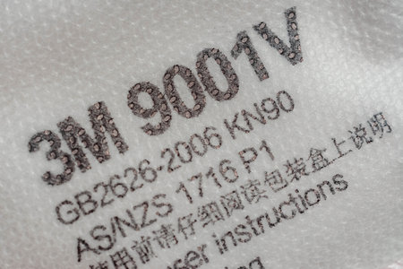 Macro photo of face shield 3m 9001v Kn90 1716 P1 with original marking closeup. Reliable protection...