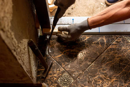 Installation of metal front doors in a private house, close-up.の写真素材