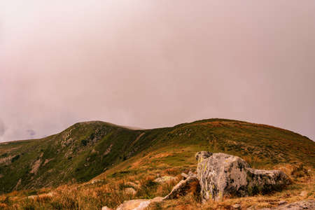 At the top of the mountain Gutyn Tomnatyk, the view from the mountain on the Montenegrin overcast ridge, breathtaking landscapes, enchant with their grandeur. 2020の写真素材