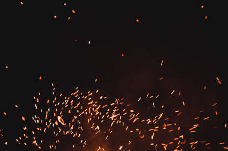 close up of sparks from fire, sparks on black background, extravaganza of fire, magic with sparks. 2020の写真素材
