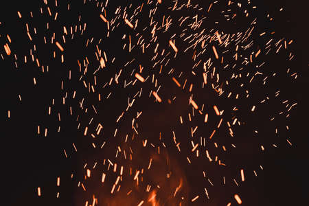 close up of sparks from fire, sparks on black background, extravaganza of fire, magic with sparks....