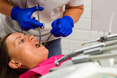 Local anesthesia, dentist carpal syringe injects the patient's gum anesthesia, dental carpule...