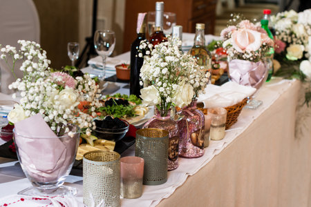 Room with decorated tables and chairs, wedding ceremony, buffet and dining room in the scenery. 2020