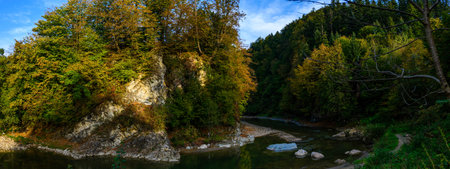 Two lovers embracing on top of a hill overlooking the river, Romantic setting, Couple of newlyweds...