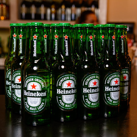 Lviv, Ukraine November 19, 2020: Beer Heineken bottles are on the bar. 2020のeditorial素材
