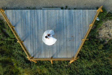 Dance of the bride in a dress on the observation deck, top view, touching moment. 2020の写真素材