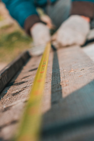 Measurement of length by means of a tape measure, measurement of length of a metal profile. 2020の写真素材