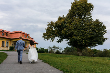Brides walk on their wedding day, couple walk on their festive and touching day. 2020の写真素材