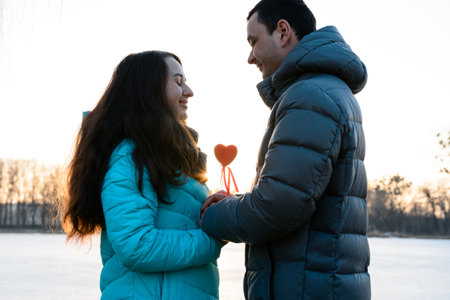 Loving couple in the park on Valentine's Day, walking in the evening park for two, romantic evening.newの写真素材