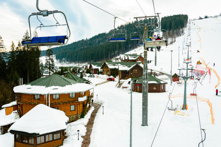 Bukovel, Ukraine February 3, 2019: vacation in the Carpathians, ski resort Bukovel, ski lift.newのeditorial素材